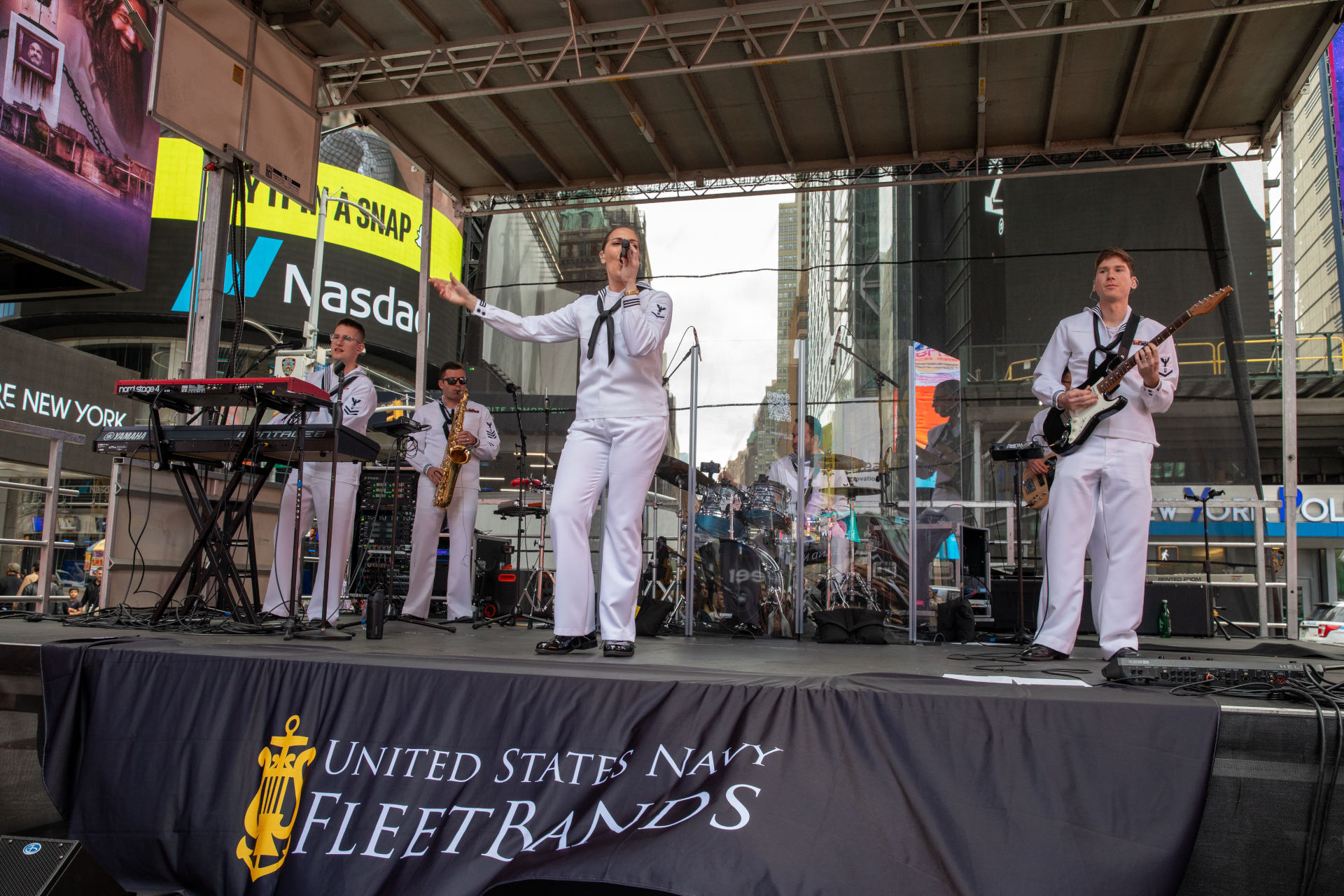 tonh-2025-navy-band-northeast Navy Band Northeast performs in Times Square during Fleet Week New York 2025, May 25. This year, America’s warfighting Navy and Marine Corps celebrate 250 years of protecting American prosperity and freedom. Fleet Week New York 2025 honors the Navy, Marine Corps, and Coast Guard’s enduring role on, under, and above the seas. (U.S. Navy photo by Mass Communication Specialist 2nd Class Sheryssa Dodard)